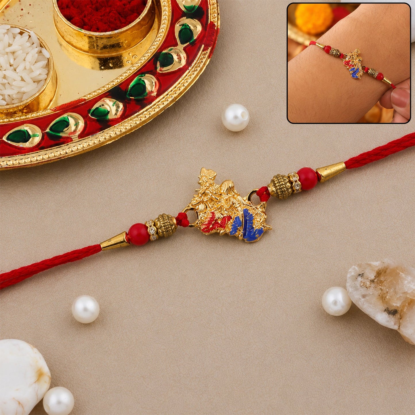 Golden Peacock (Mor) Rakhi with Blue Enamel & Red Beads