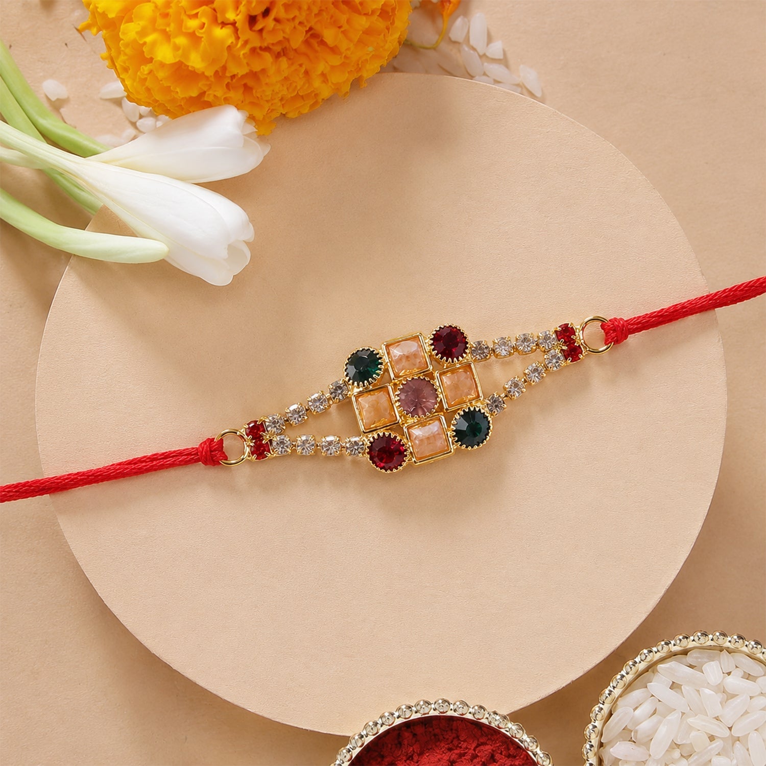 Navratna Kundan Stone Studded Rakhi with AD Border