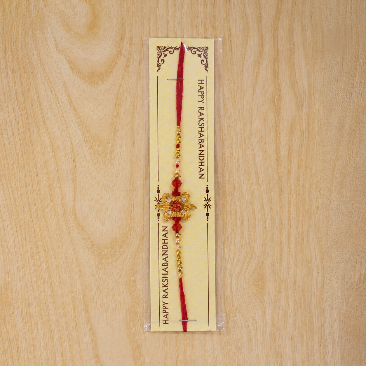 Petite Red Meenakari Round Rakhi with AD Chain