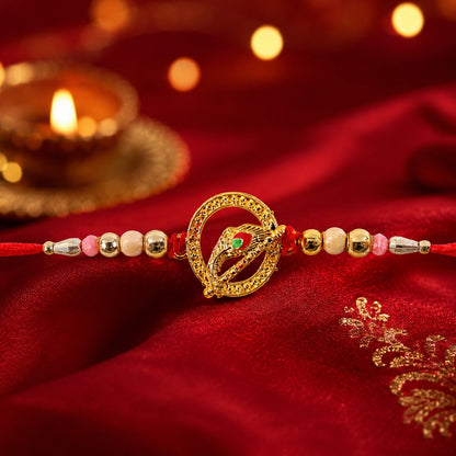 Golden Peacock Spiral Rakhi with Beads