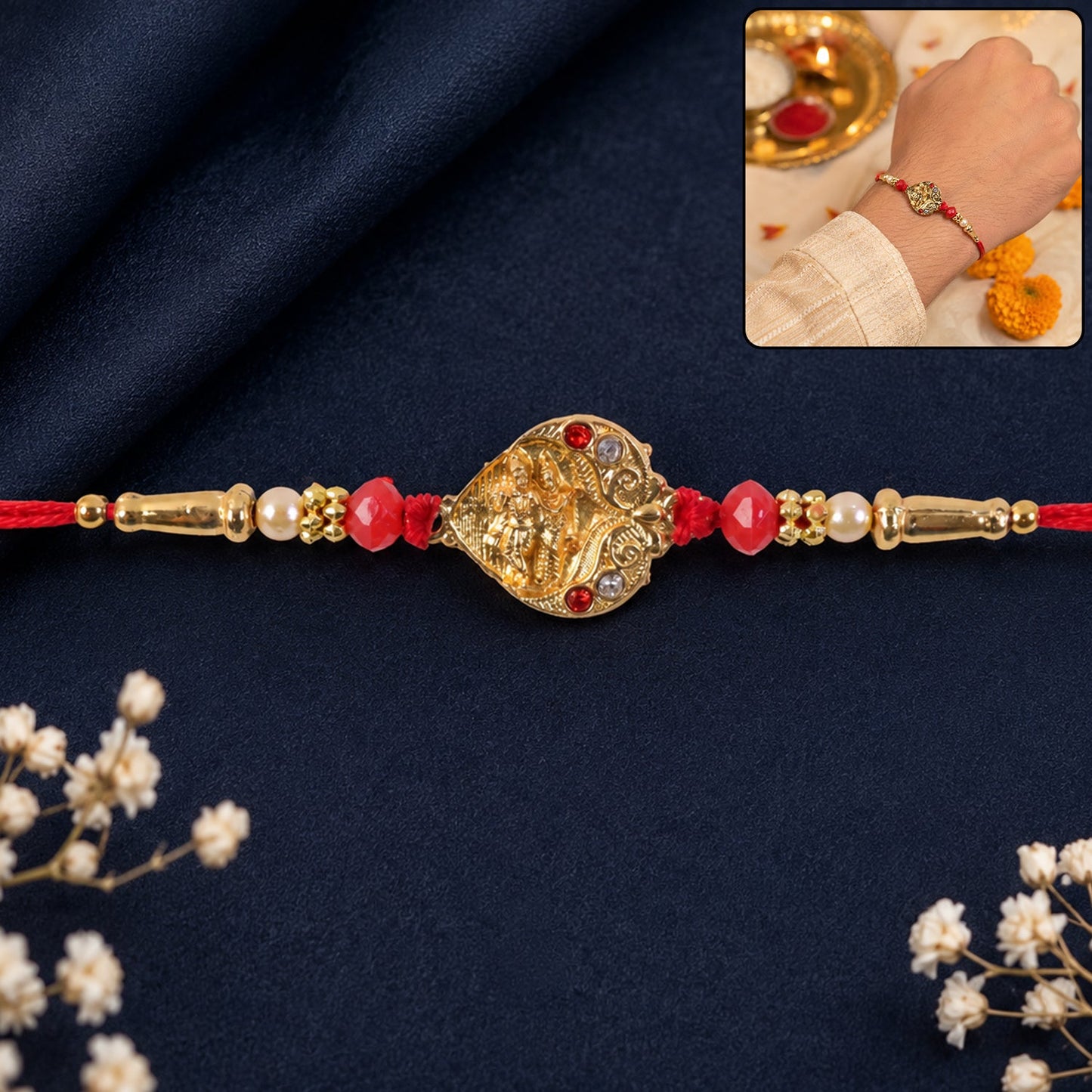 Golden Ganesha Oval Rakhi with Red Crystal Beads