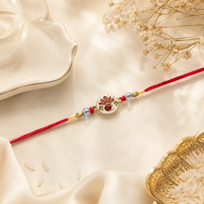 Hand-Painted Ceramic Floral Rakhi with Red Beads