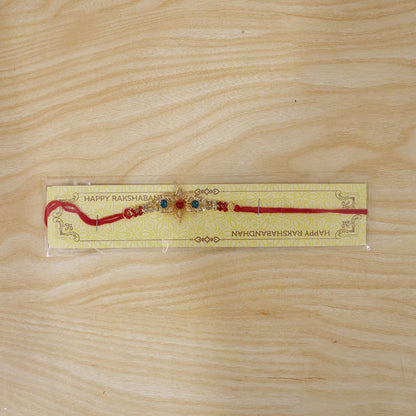 Star-Shaped Kundan Rakhi with Pearls & Red Stone