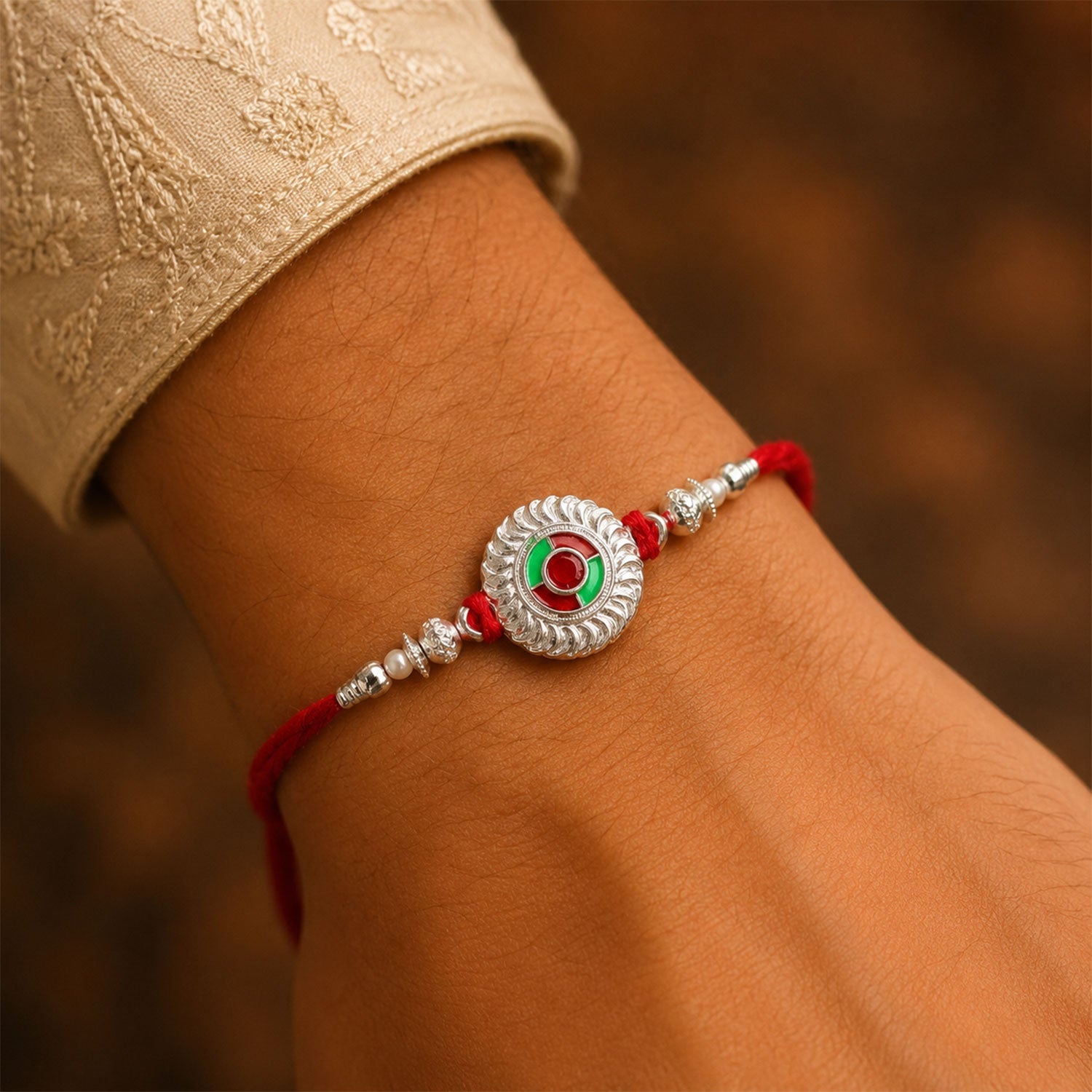 Silver Round Meenakari Rakhi with Pearls