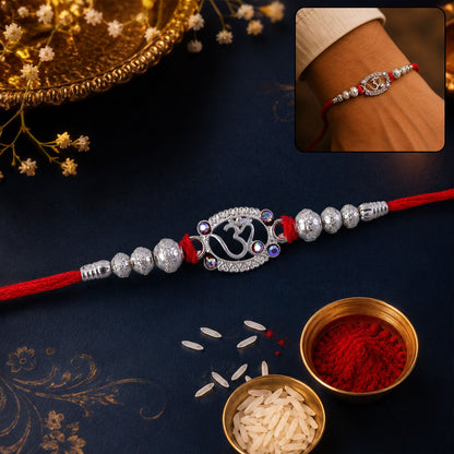 Oxidised Silver Om (?) Rakhi with Crystal Beads