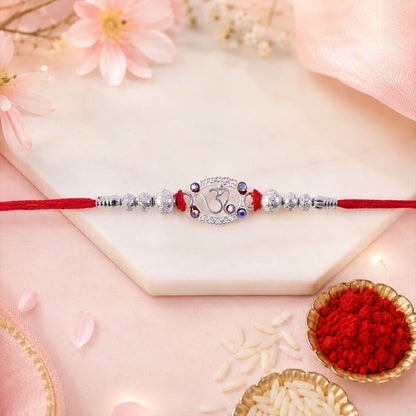 Oxidised Silver Om (?) Rakhi with Crystal Beads