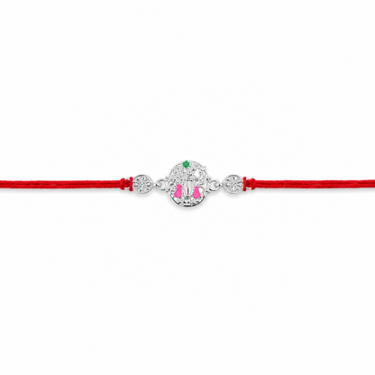 Silver Floral Meenakari Rakhi on Red Thread