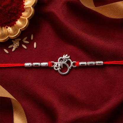Silver Om (?) Rakhi with Textured Beads