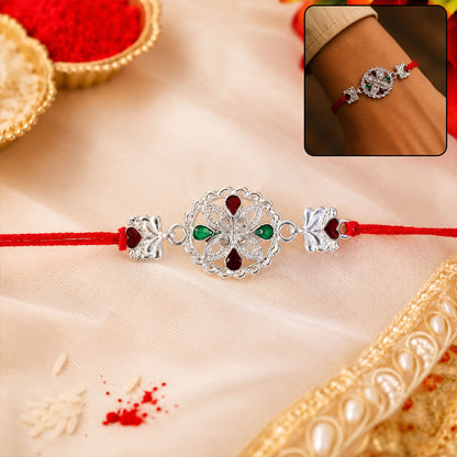 Silver Floral Rakhi with Red & Green Teardrop Stones