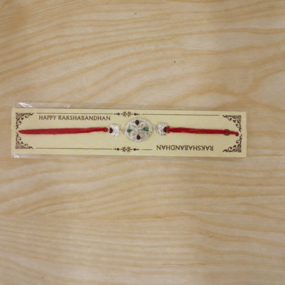 Silver Floral Rakhi with Red & Green Teardrop Stones