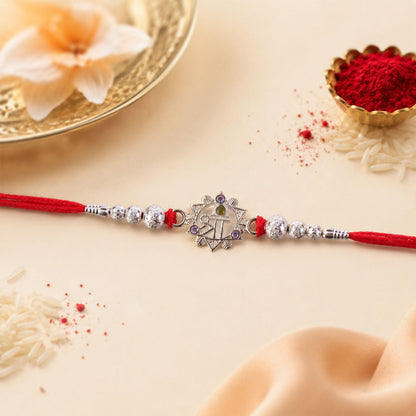 Silver Swastik Rakhi with Red Stones & Beads