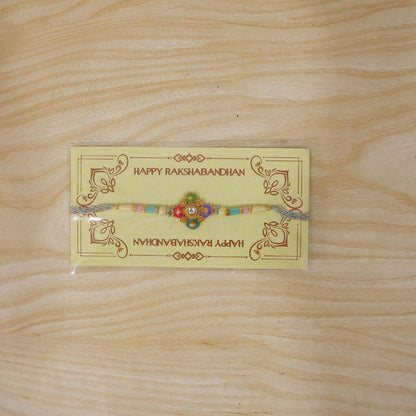 Colourful Meenakari Floral Rakhi with Pastel Beads for Brother