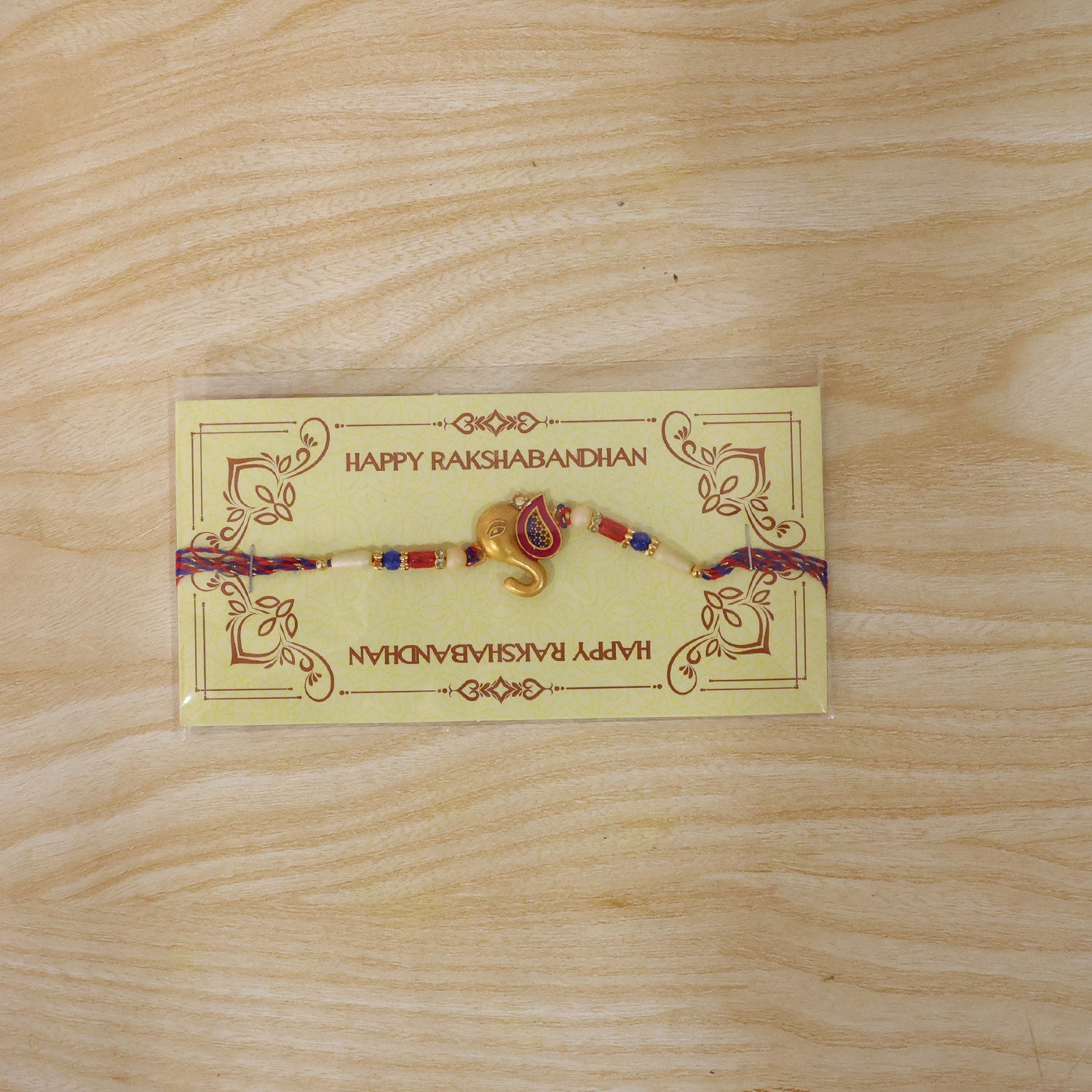 Golden Lord Ganesha Meenakari Rakhi with Beads for Brother
