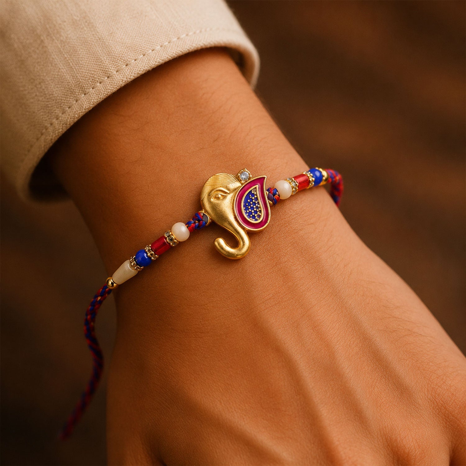 Golden Lord Ganesha Meenakari Rakhi with Beads for Brother