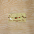 Red Green Meenakari Kundan Rakhi – Traditional Floral Design