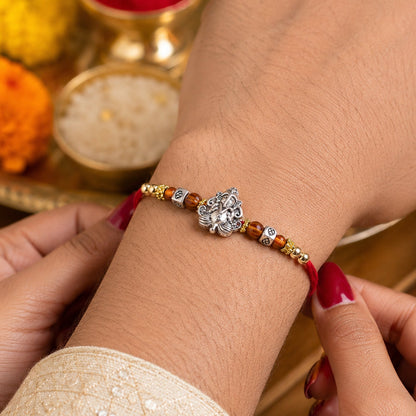 Silver Lord Ganesha Rakhi with Rudraksha & Wooden Beads for Bro