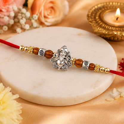 Silver Lord Ganesha Rakhi with Rudraksha & Wooden Beads for Bro
