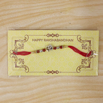Sacred Silver Om Rakhi with Rudraksha Beads for Brother