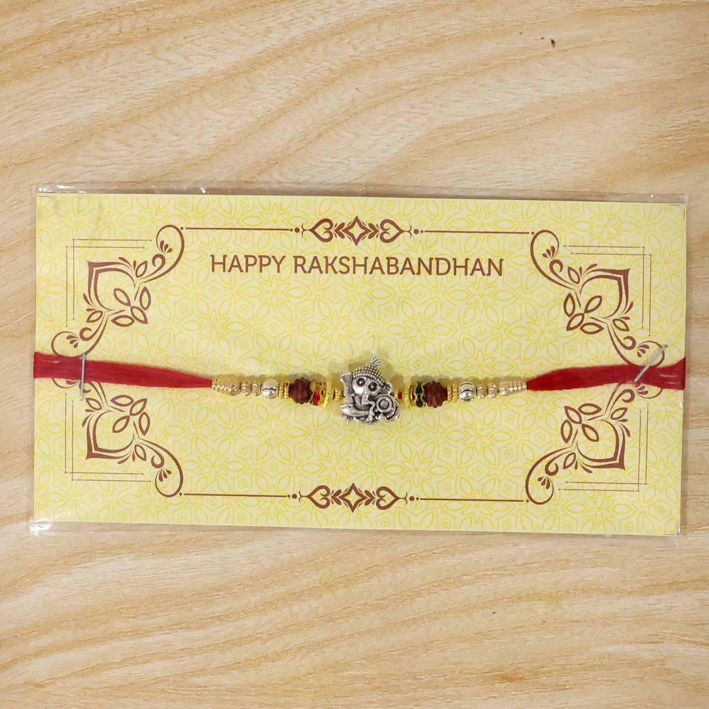 Antique Silver Baby Ganesha Rakhi with Rudraksha for Brother