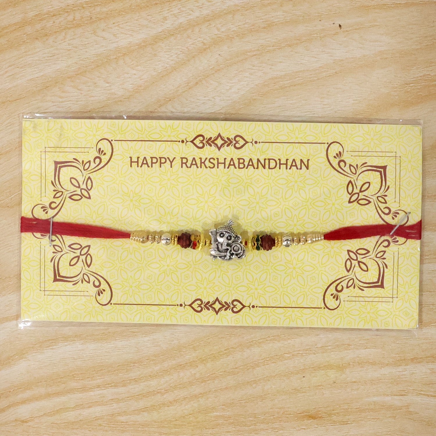Antique Silver Baby Ganesha Rakhi with Rudraksha for Brother