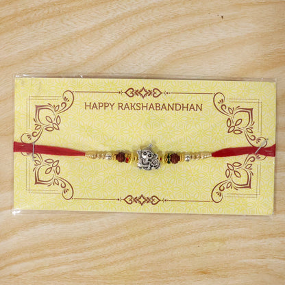 Antique Silver Baby Ganesha Rakhi with Rudraksha for Brother