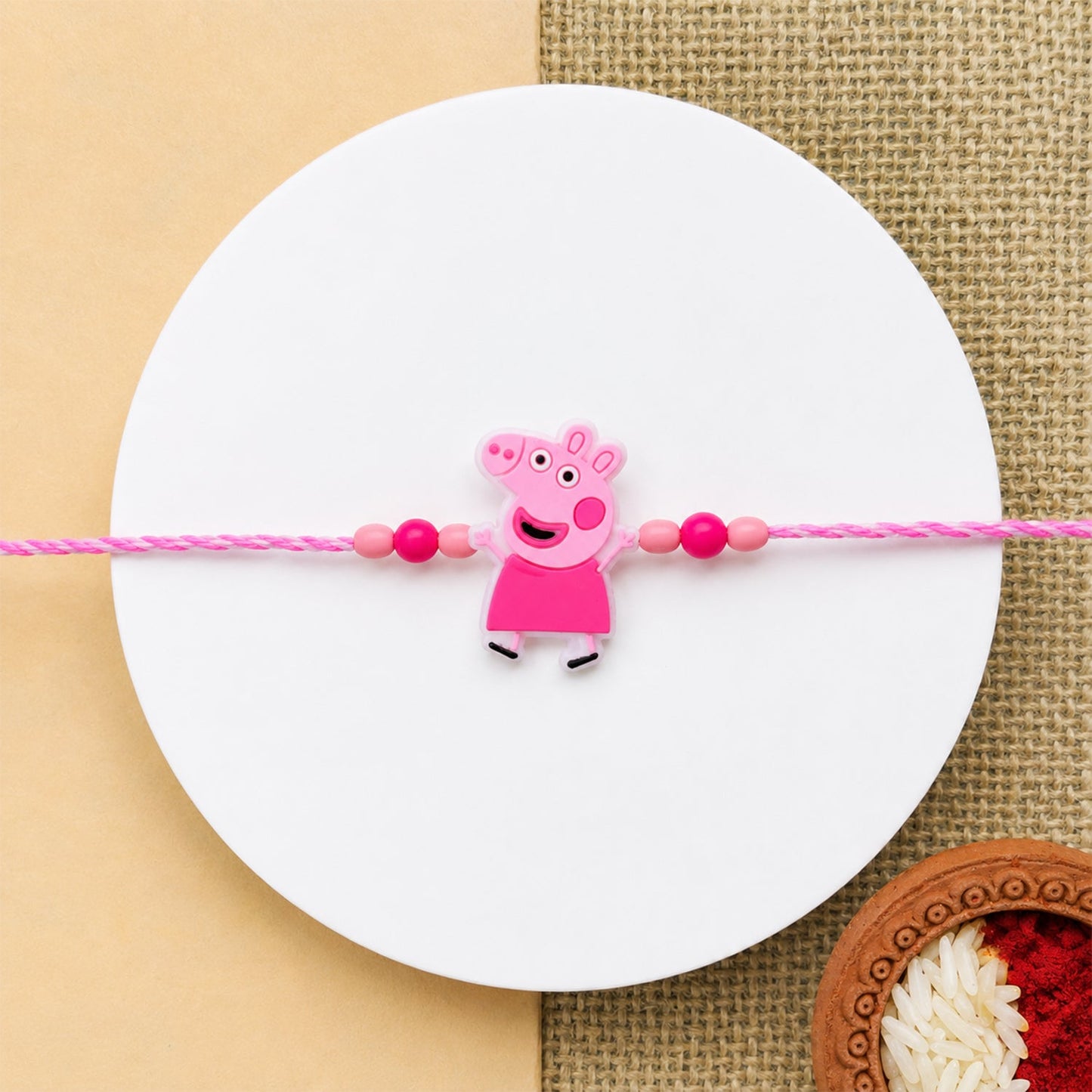 Cartoon Character Rakhi with Pink Beads for Kids