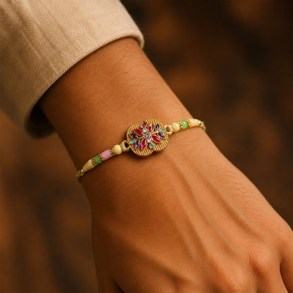 Golden Meenakari Floral Rakhi with AD Stones & Pearls for Brother