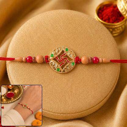 Auspicious Golden Swastik Rakhi with Wooden & Red Beads for Brother
