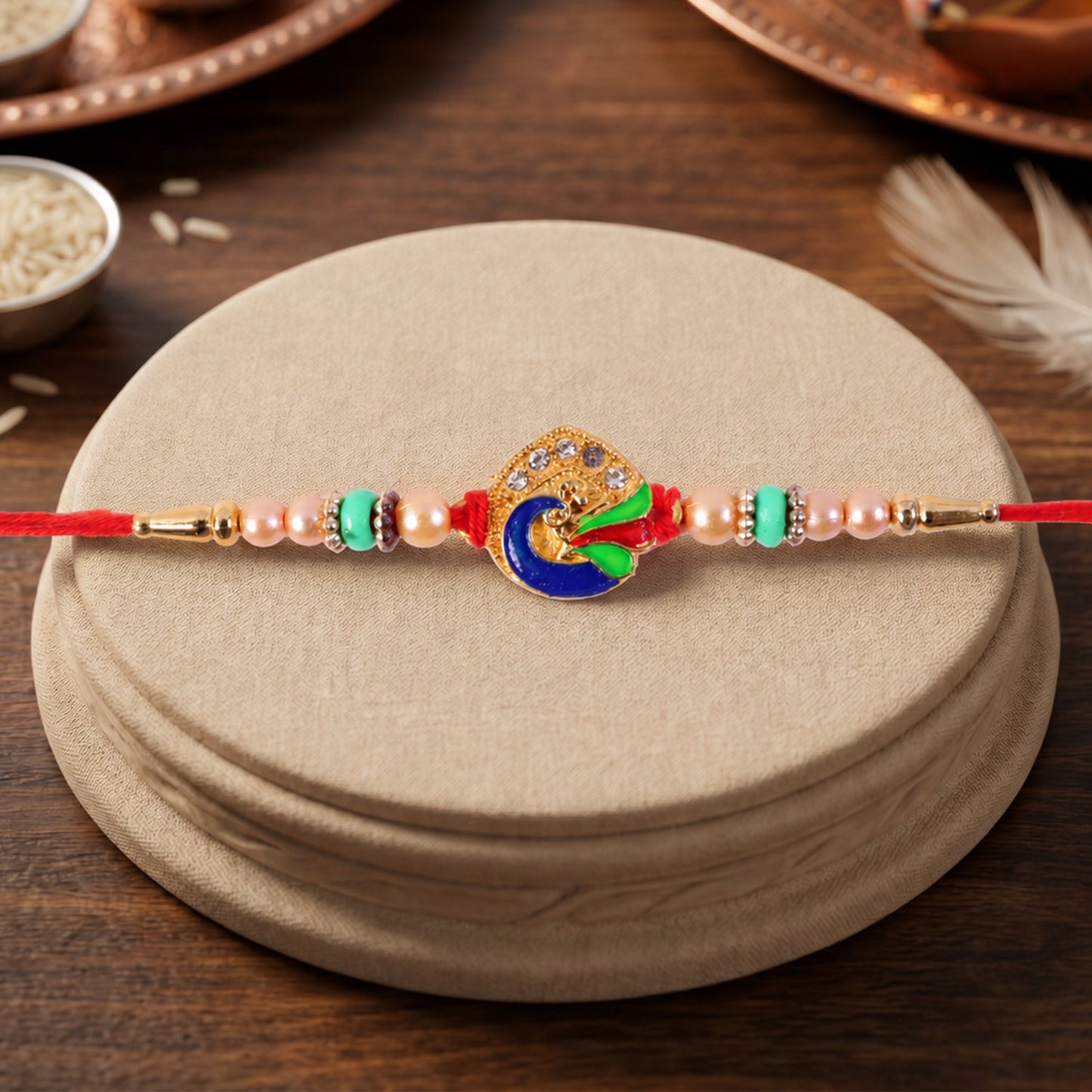 Golden Meenakari Peacock Rakhi with Pearl & Turquoise Beads for Bro