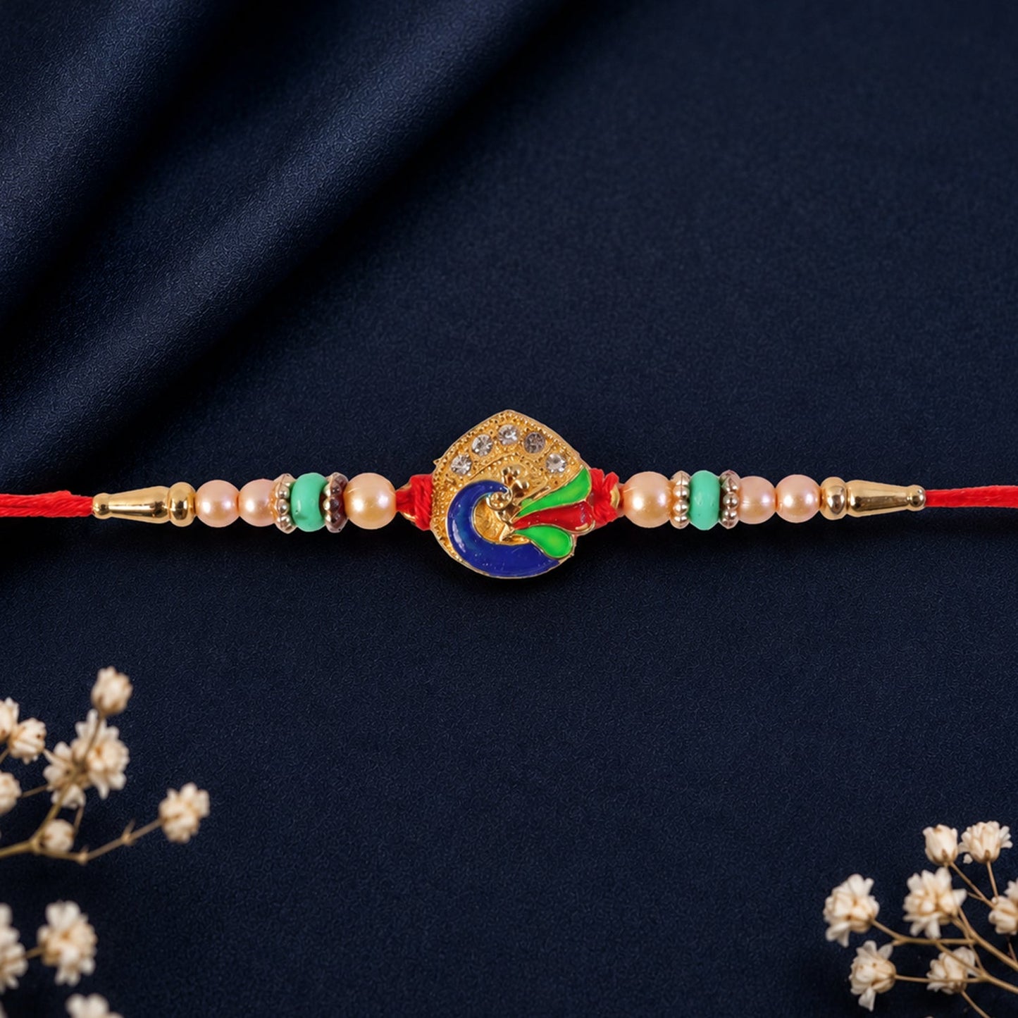 Golden Meenakari Peacock Rakhi with Pearl & Turquoise Beads for Bro