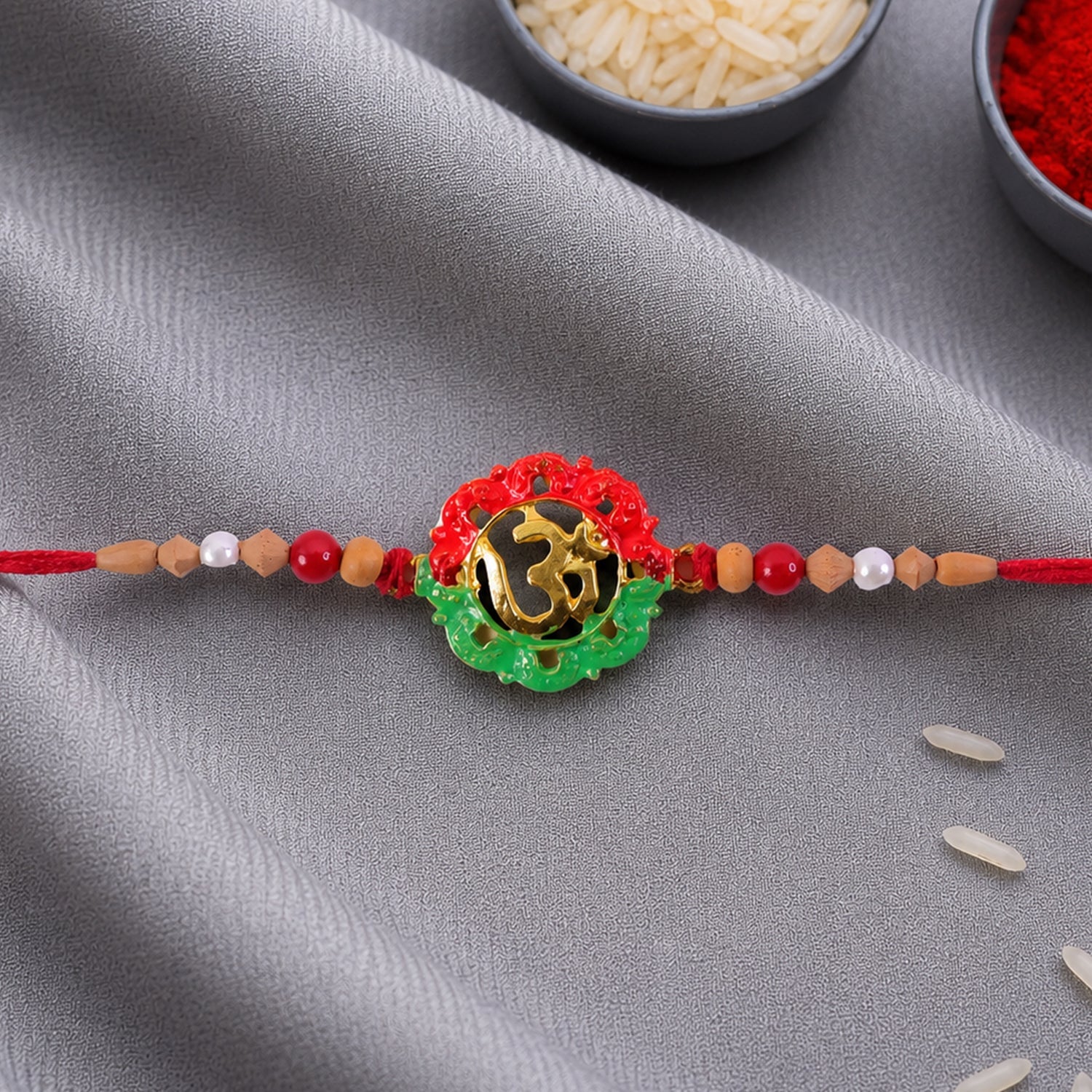 Sacred Om Meenakari Rakhi with Wooden & Pearl Beads for Brother