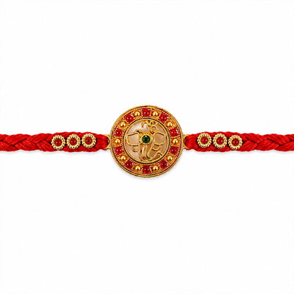 Elegant Golden Ganesha Round Rakhi with Red Crystal Bead for Brother