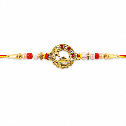 Antique Golden Peacock Round Rakhi with Pearl & Red Beads for Brother