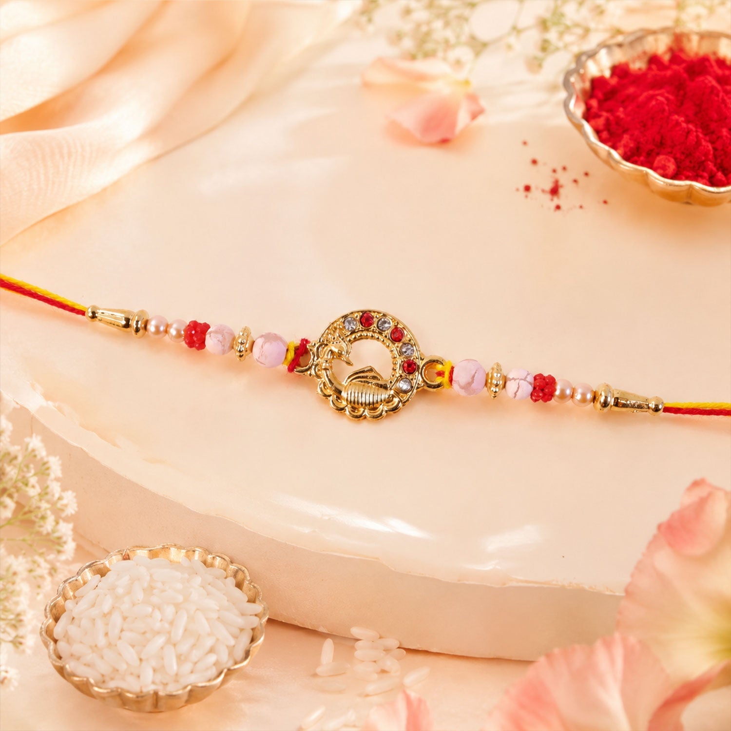 Antique Golden Peacock Round Rakhi with Pearl & Red Beads for Brother