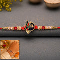Blue Meenakari Peacock Rakhi – Elegant Traditional Gifting