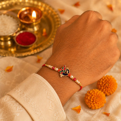 Blue Meenakari Peacock Rakhi with Pearl & Crystal Beads for Brother