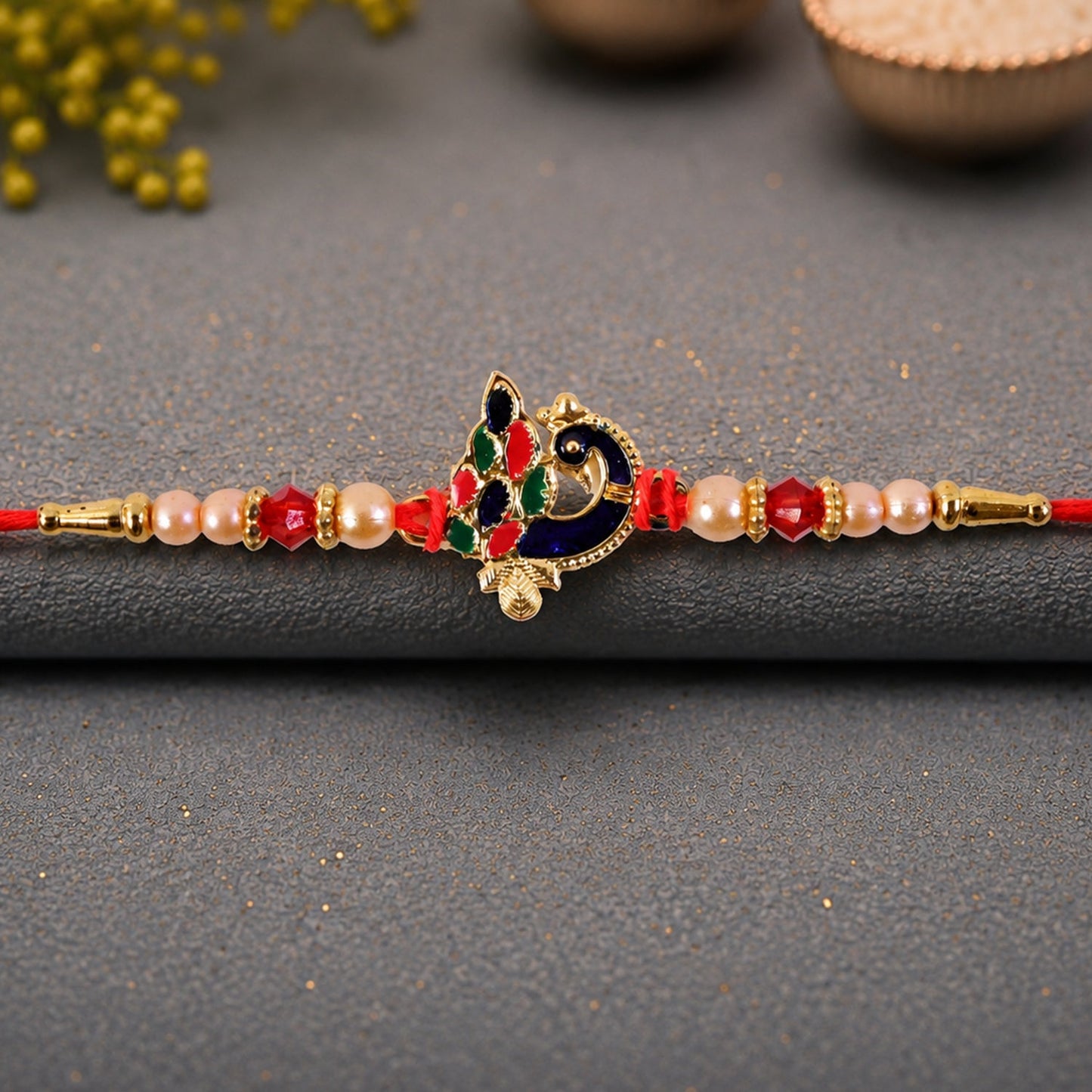 Blue Meenakari Peacock Rakhi with Pearl & Crystal Beads for Brother