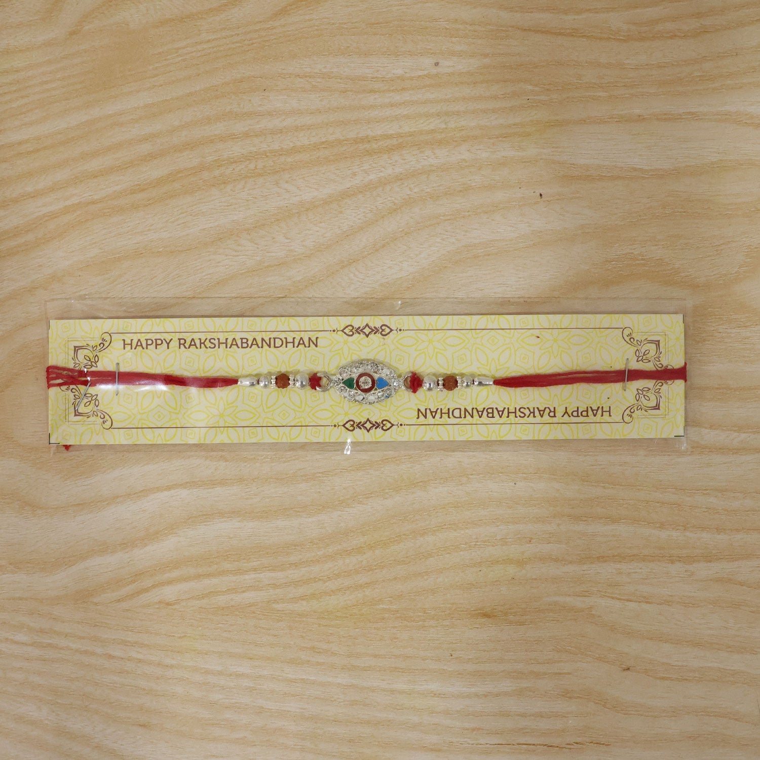 Silver Stone Design Rakhi with Beads for Brother