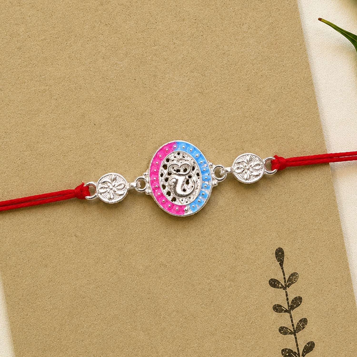 Silver Meenakari Rakhi with Pink & Blue Enamel for Brother