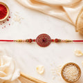 Red Crystal Floral Rakhi – Elegant Traditional Tie for Siblings