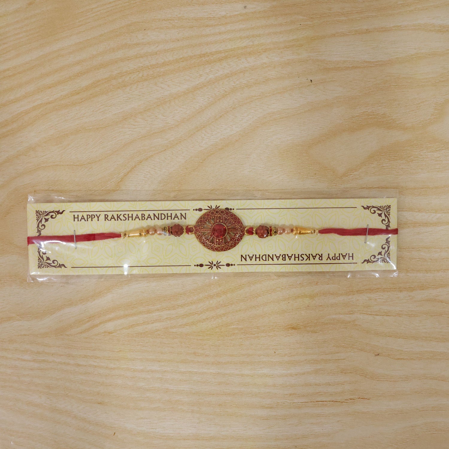 Red Crystal Floral Rakhi with Rudraksha & Pearl Beads for Brother