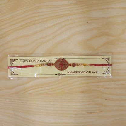 Red Crystal Floral Rakhi with Rudraksha & Pearl Beads for Brother