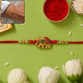 Rakhi – Stylish Gold Elephant Charm with Beads & Red Thread