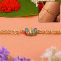 Peacock Ganesh Charm Rakhi – Stylish Festive Brother's Thread