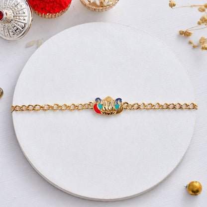 Side view of decorative beaded Peacock Ganesh rakhi bracelet