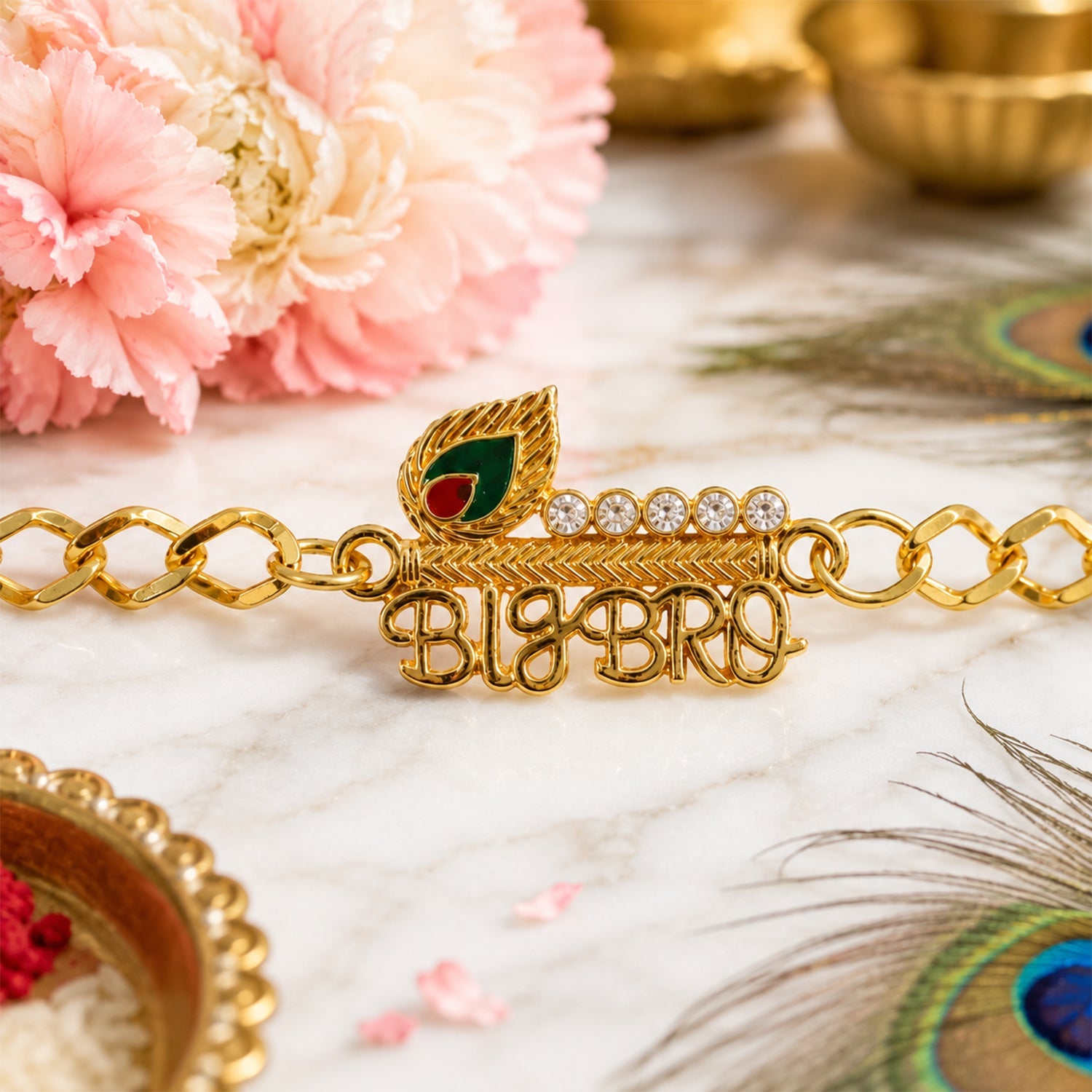Stone studded rakhi with decorative beads on gold tone thread