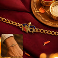 Gold Tone Enamel Rakhi – Stylish Traditional Gift for Rakshabandhan