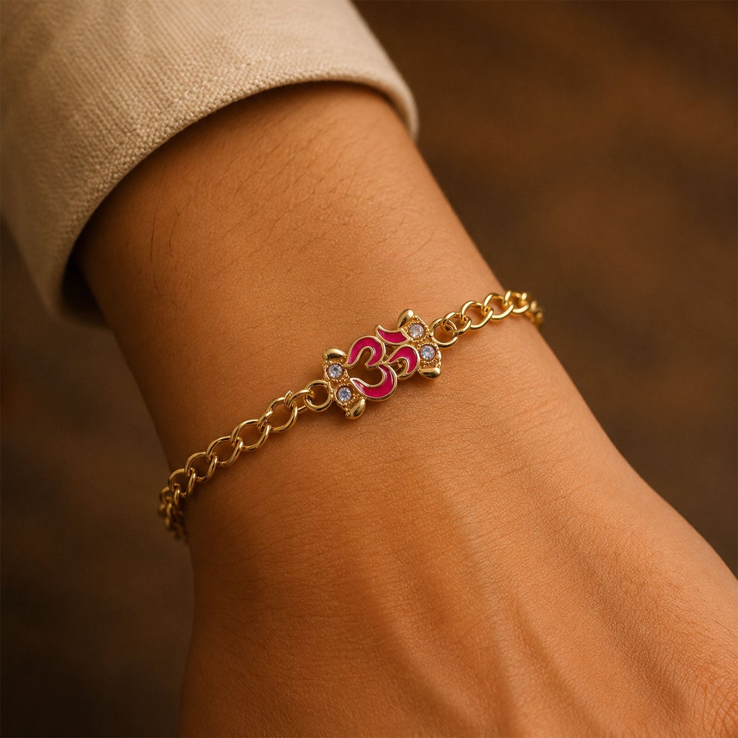 Om Stone Studded Gold Tone Rakhi Bracelet for Raksha Bandhan