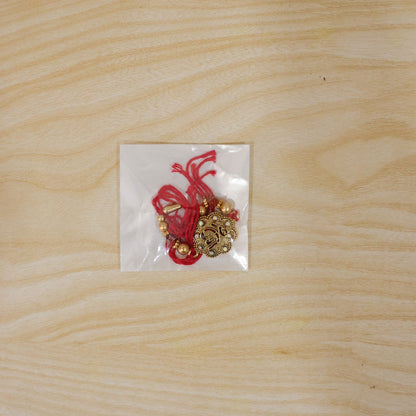 Stylish Stone Studded Gold Tone Rakhi