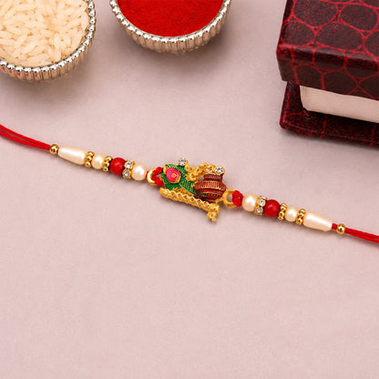 Krishna Matki Rakhi with Peacock Feather and Pearl Beads